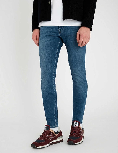 Shop 7 For All Mankind Men's Mid Blue Ronnie Tapered Luxe Performance Plus Skinny Tapered Jeans