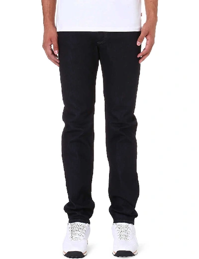 Shop Diesel Buster Tapered Mid-rise Stretch-denim Jeans In Blue