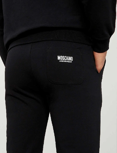 Shop Moschino Logo-tape Cotton-jersey Jogging Bottoms