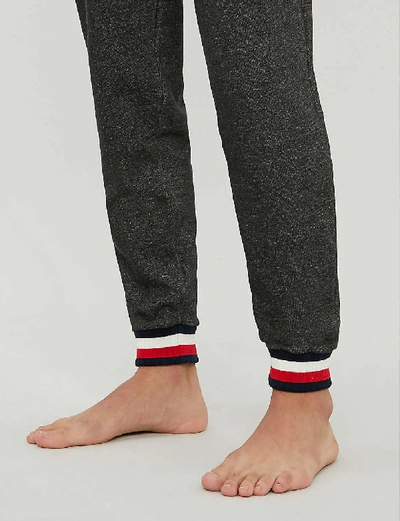 Shop Tommy Hilfiger Tapered Recycled Polyester Jogger Bottoms In Dark Grey Heather