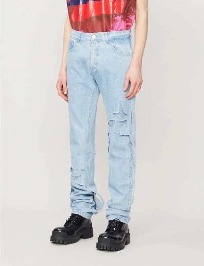 Shop Raf Simons Distressed Tapered Jeans In Light Blue