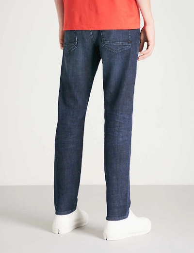 Shop Hugo Boss Slim-fit Tapered Jeans In Navy