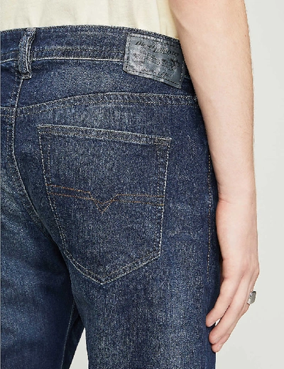 Shop Diesel Buster Tapered Jeans In Denim