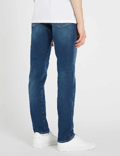 Shop Replay Anbass Hyperflex Plus Slim Stretch-denim Jeans In Medium+blue