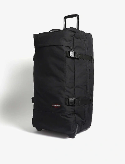 Shop Eastpak Black Andy Warhol Tranverz Two-wheel Suitcase 78cm