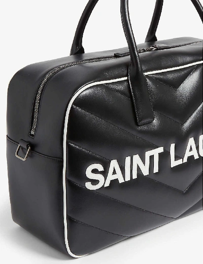Shop Saint Laurent Logo Quilted Leather Bowling Bag In Black White