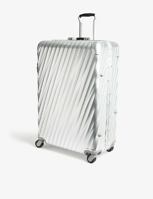tumi silver suitcase