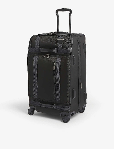 Shop Tumi Black Merge Four-wheeled Hold Suitcase 66cm