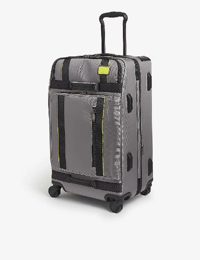 Shop Tumi Merge Four-wheeled Hold Suitcase 66cm In Grey/bright Lime