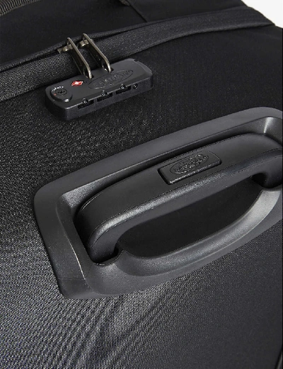 Shop Eastpak Tranverz Large Four-wheel Nylon Suitcase 79cm In Black