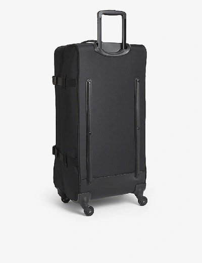 Shop Eastpak Tranverz Large Four-wheel Nylon Suitcase 79cm In Black