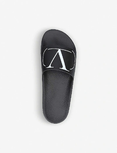 Shop Valentino Logo-embossed Rubber Sliders In Black