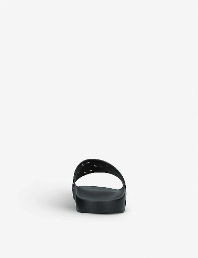 Shop Gucci Pursuit Gg Cutout Rubber Sliders In Black