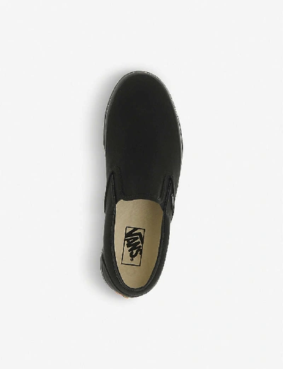 Shop Vans Classic Slip-on Trainers In Black+mono