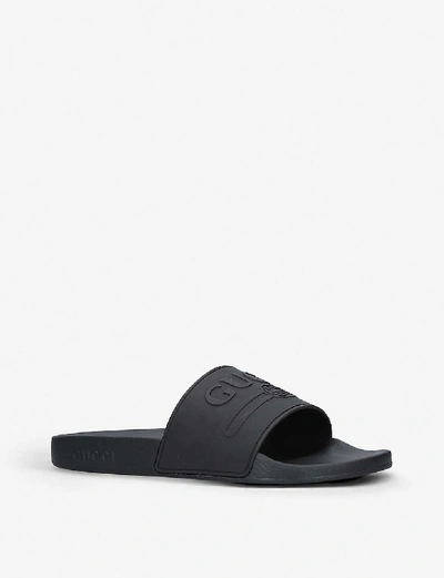 Shop Gucci Pursuit Rubber Sliders In Black