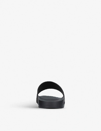 Shop Gucci Pursuit Rubber Sliders In Black