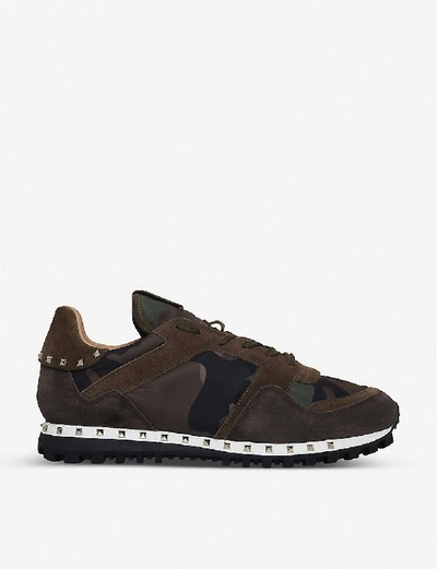 Shop Valentino Rockstud Studded Camouflage Suede Trainers