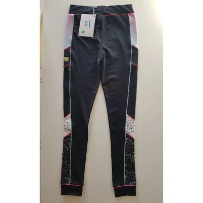 Pre-owned Puma Black Synthetic Trousers