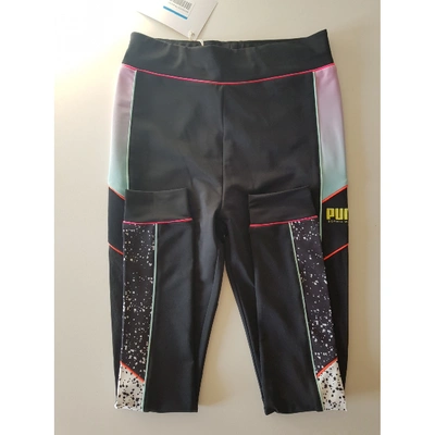 Pre-owned Puma Black Synthetic Trousers