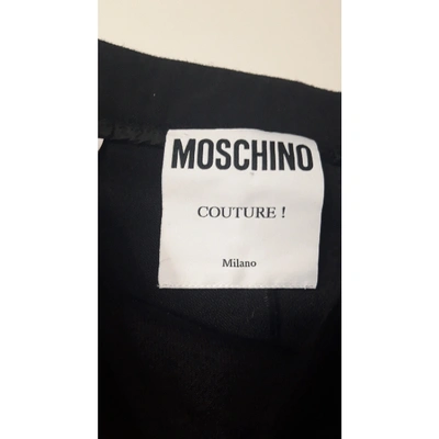 Pre-owned Moschino Wool Straight Pants In Black