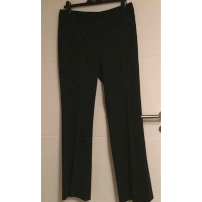 Pre-owned Elie Tahari Wool Trousers In Black