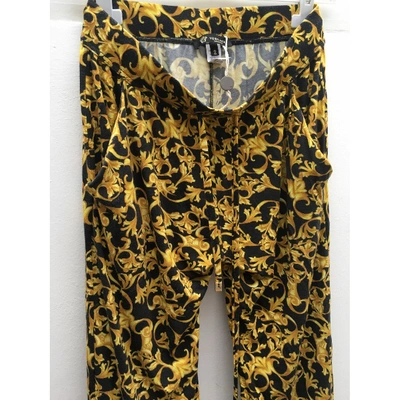 Pre-owned Versace Trousers In Gold