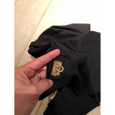 Pre-owned Ferragamo Wool Trousers In Black