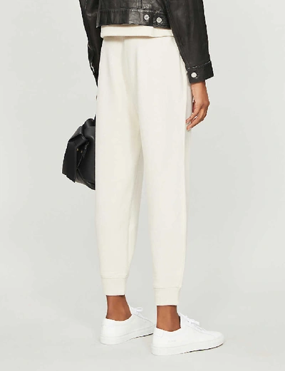 Shop Vince Cozy Drawstring-waist Tapered Woven Trousers In Oyster