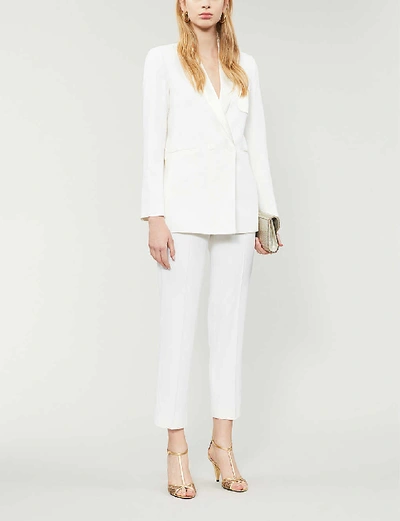 Shop Sandro Jens Stretch-crepe Trousers In Ivory