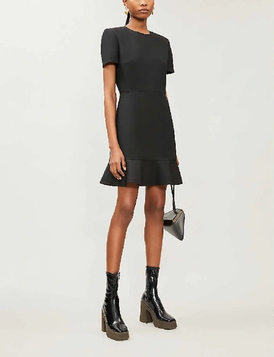 Shop Stella Mccartney Padded-shoulder Wool-blend Mini Dress In Black