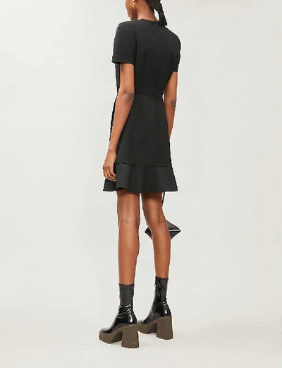 Shop Stella Mccartney Padded-shoulder Wool-blend Mini Dress In Black