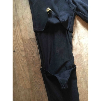 Pre-owned Murmur Trousers In Black