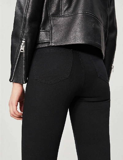 Shop Topshop Joni High-rise Skinny Jeans In Black