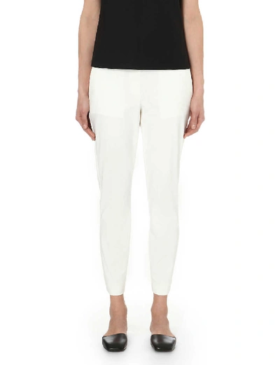 Shop Theory Thaniel Slim-fit Tapered Cotton-blend Trousers In New Ivory