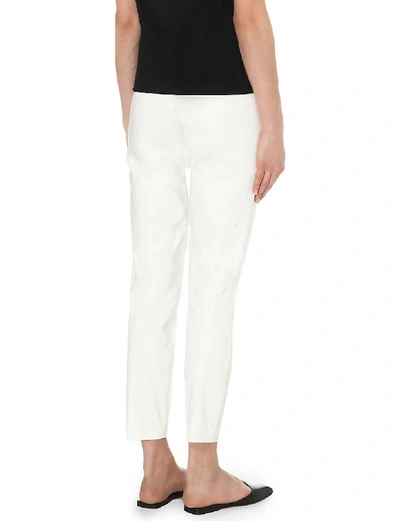 Shop Theory Thaniel Slim-fit Tapered Cotton-blend Trousers In New Ivory