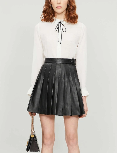 Shop Maje Jabaki Pleated Leather Mini Skirt In Black