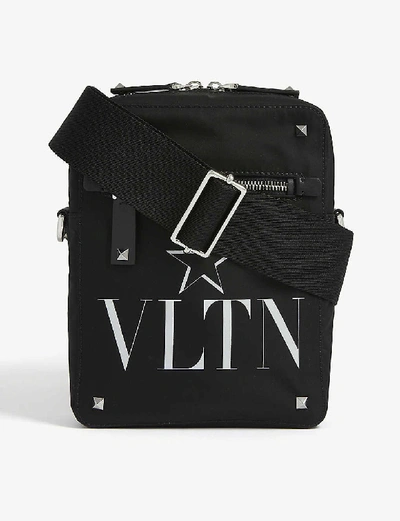 Shop Valentino Star Cross-body Bag In Black