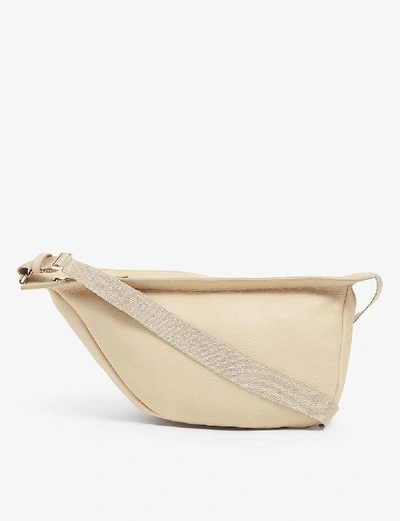 Shop The Row Slouchy Leather Banana Bag In Cream Silk Pt