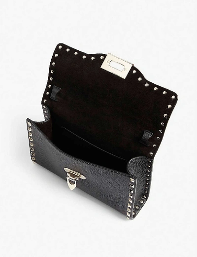 Shop Valentino Rockstud Leather Cross-body Bag In Black