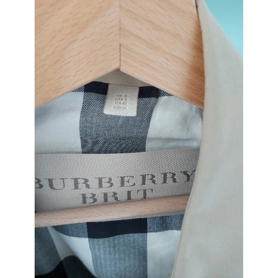 Pre-owned Burberry Beige Viscose Trench Coats