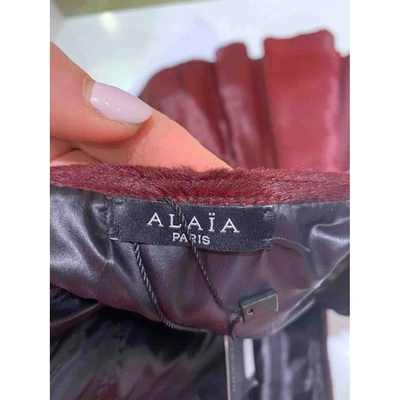 Pre-owned Alaïa Pony-style Calfskin Mid-length Skirt In Red