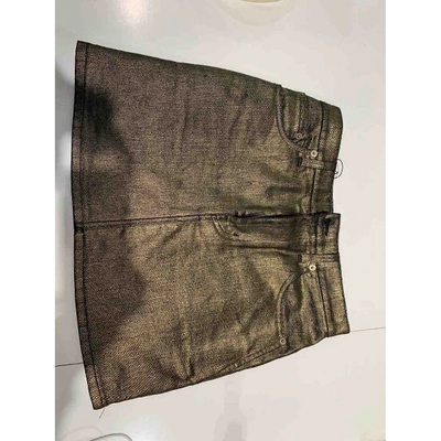 Pre-owned Saint Laurent Gold Cotton - Elasthane Skirt