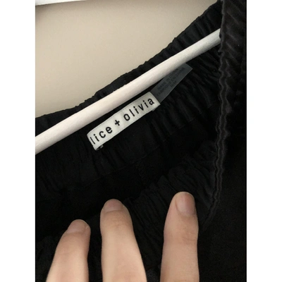 Pre-owned Alice And Olivia Trousers In Black
