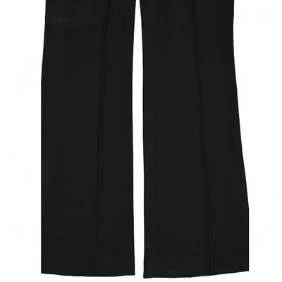 Pre-owned Donna Karan Wool Trousers In Black