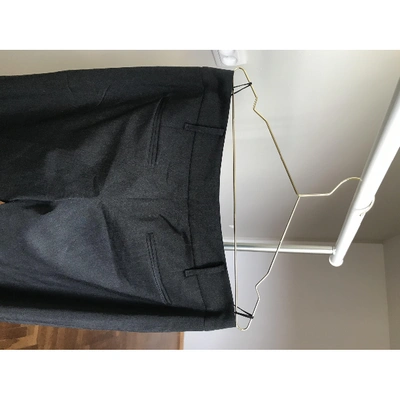 Pre-owned Hugo Boss Wool Trousers In Black