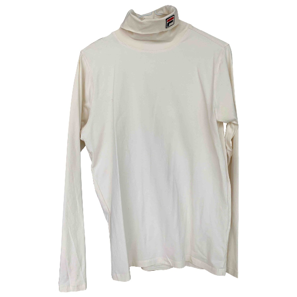 beige fila shirt