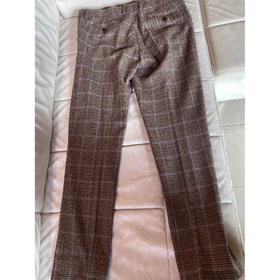 Pre-owned Dolce & Gabbana Wool Trousers In Brown