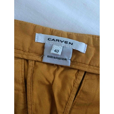 CARVEN Pre-owned Trousers In Orange