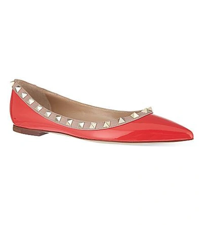 Shop Valentino Rockstud Flats In Orange