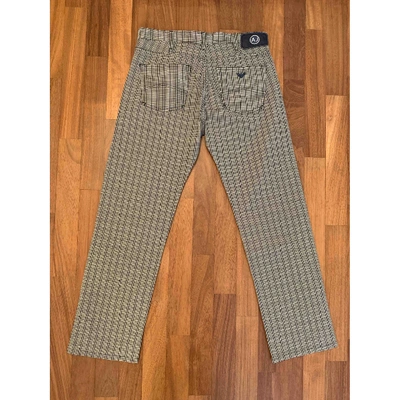 Pre-owned Armani Jeans Trousers In Beige